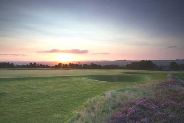 A sunrise view of a green at Crosland Heath Golf Club.