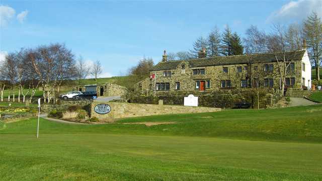 A view of a hole and the clubhouse at Ryburn Golf Club.