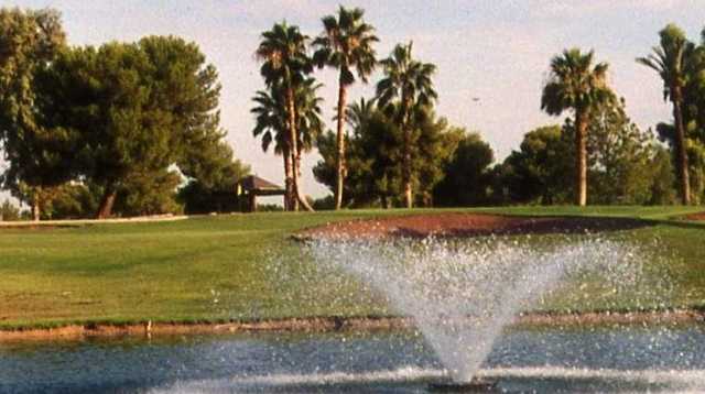 A view of a hole with water fountain in foreground at Ken McDonald Golf Course