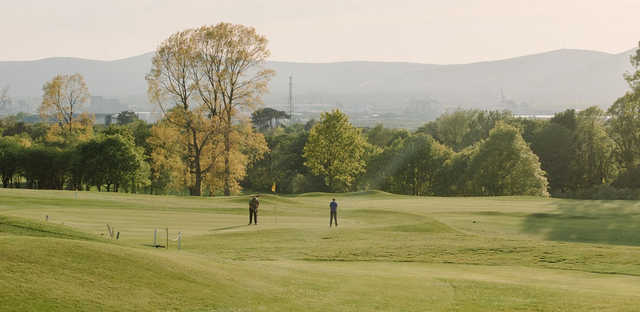 A spring day view of a green at Holywood Golf Club.