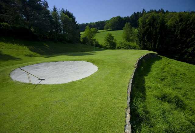 A view of green #5 protected by bunker at Schloss Georghausen Golf Club