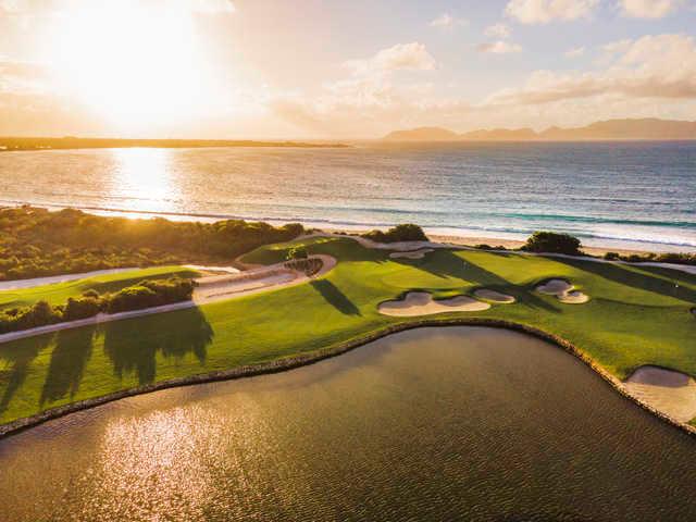 Aerial view of a green at Aurora International Golf Club.