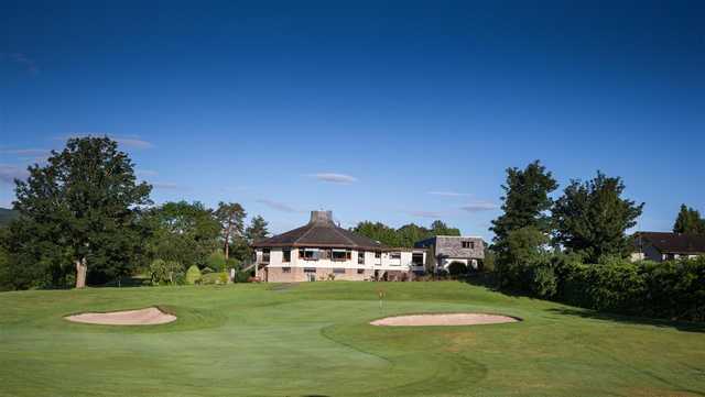 A view of a well protected green and the clubhouse in background at Banchory Golf Club.