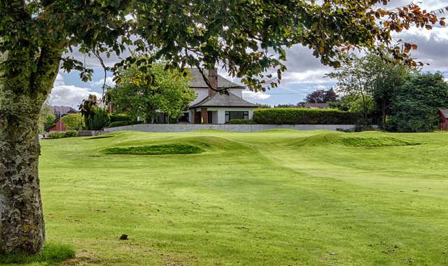 A view of hole #18 at Dumfries and Galloway Golf Club.