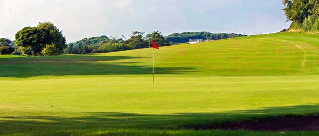 A sunny day view of a hole at Aberdour Golf Club.