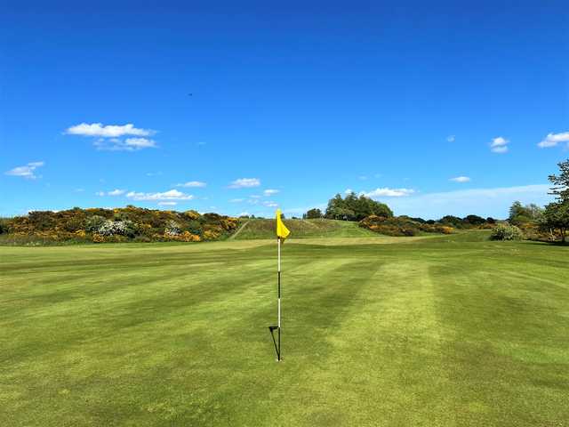 A sunny day view of a hole at Auchterderran Golf Club.