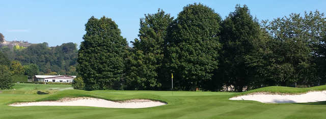 A view of a green flenaked by bunkers at Stirling Golf Club.
