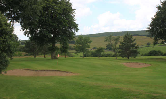 A view of a hole flanked by bunkers at Bargoed Golf Club.