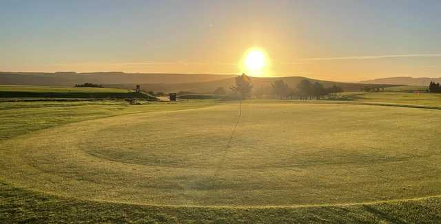 A sunny morning view of a hole at Rhondda Golf Club.