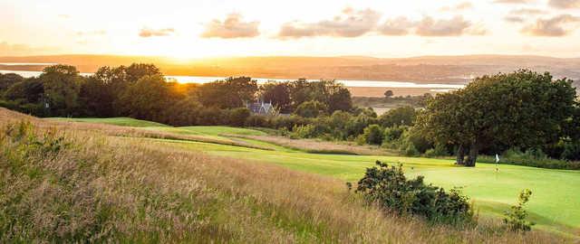 A sunny day view of a hole at Gower Golf Club.