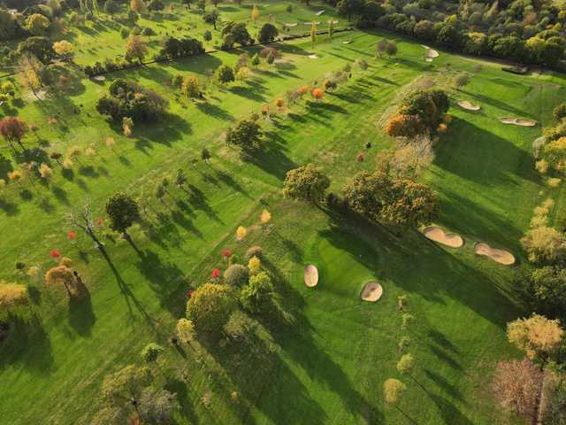 Aerial view of the 4th and 5th greens at Grims Dyke Golf Club.