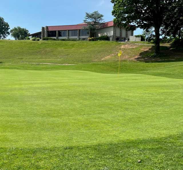View of the clubhouse from a green at Montclair Country Club.