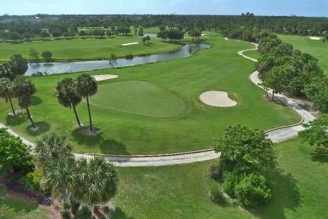 Aerial view of green #8 protected by bunkers at Osprey from Okeeheelee Golf Course