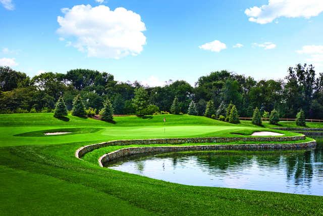 View of the 9th green protected by water at Applecross Country Club.