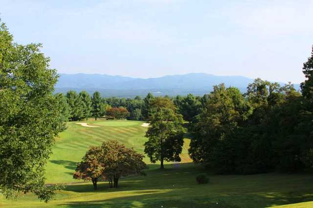 A view of a hole protected by bunkers at Boutetourt Golf & Swim Club