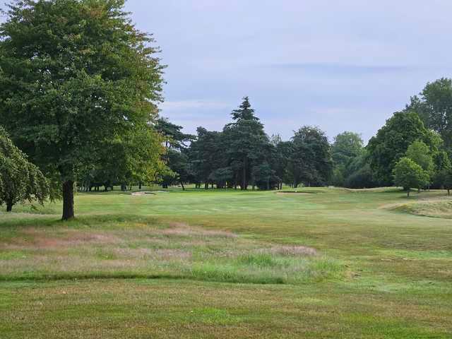 View of the 10th fairway and green from Farnham Park Course at South Buckinghamshire.