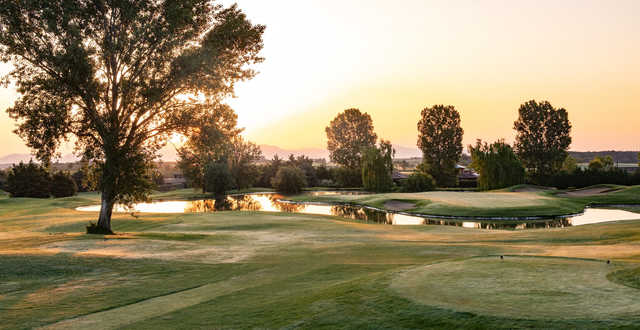 A sunset view of a tee at TorreMirona Golf & Spa Resort.