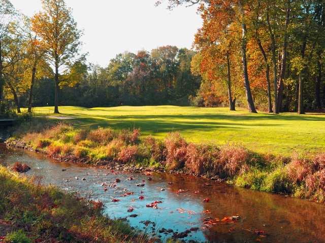 View of a fairway and green from Brookshire Golf Club.