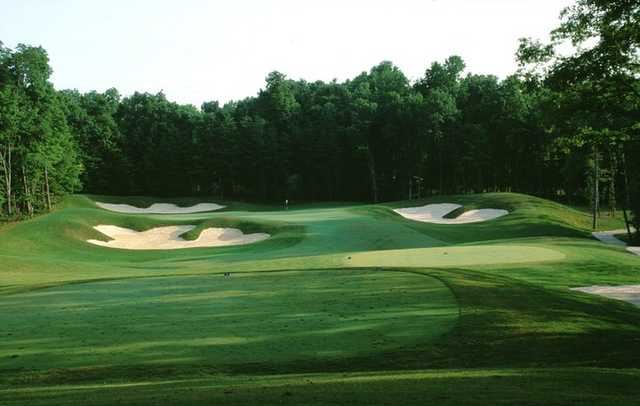 A view of green #13 protected by bunkers at Old Hickory Golf Club