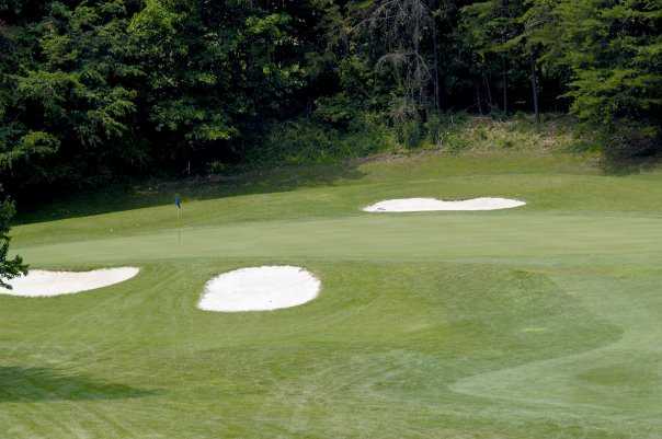 A view of hole #11 protected by bunkers at Redgate Golf Course