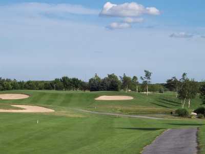 A view of the 12th green protected by bunkers at Cherry Creek Golf - The Links Course