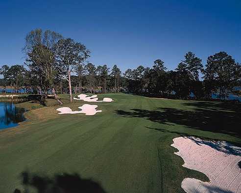 A view from fairway with bunkers on sides at Crescent Pointe Golf Club