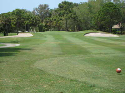 A view of the 5th green protected by bunkers at Boca Royale Golf & Country Club.