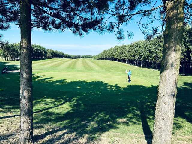 View of the 11th green from Far Grange Park & Golf Club.