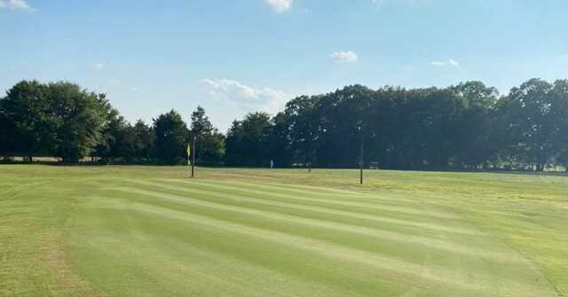 A sunny day view of a hole at Galla Creek Golf Course.