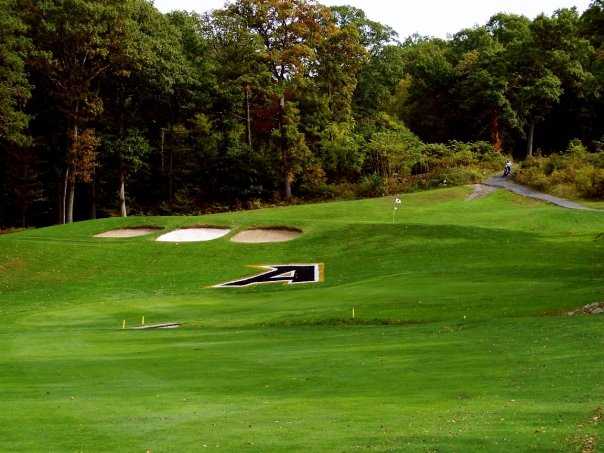 A view of green #1 protected by bunkers at West Point Golf Course