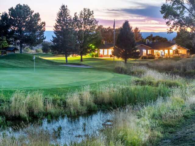 View of green #9 and the clubhouse at Cedaredge Golf Club.