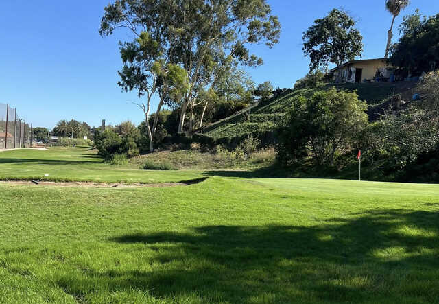 A sunny day view of a hole at National City Golf Course.
