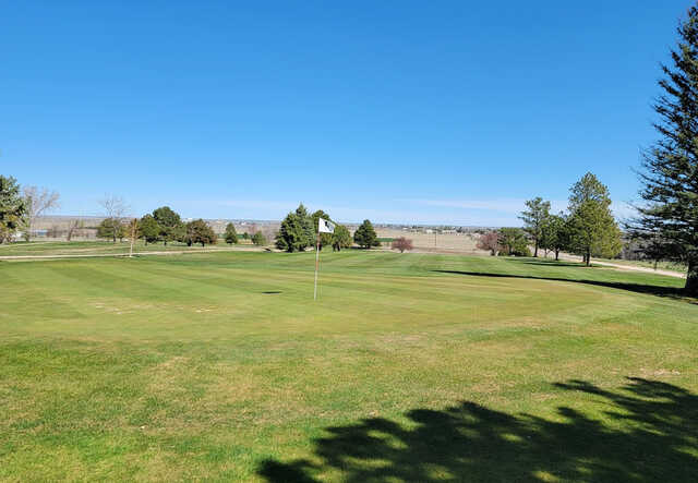 A sunny day view of a hole at Tamarack Golf Course.