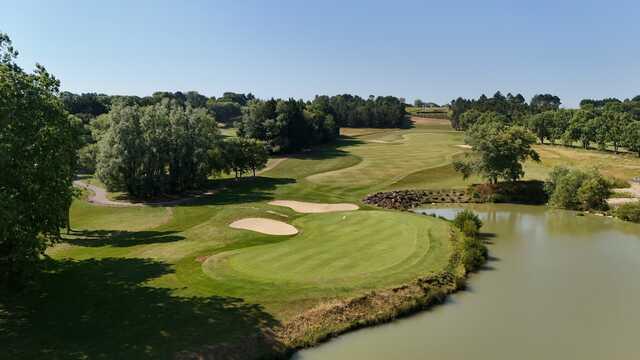 Aerial view of the 8th green from De Gaulle Course at Omaha Beach Memorial Golf Club.