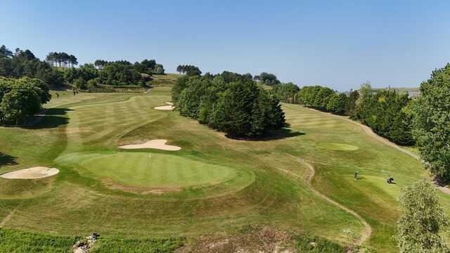 Aerial view of the 6th green from De Gaulle Course at Omaha Beach Memorial Golf Club.