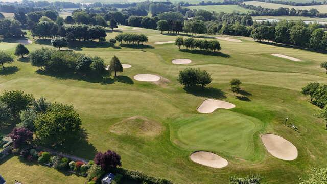 Aerial view of the 10th green from Patton Course at Omaha Beach Memorial Golf Club.
