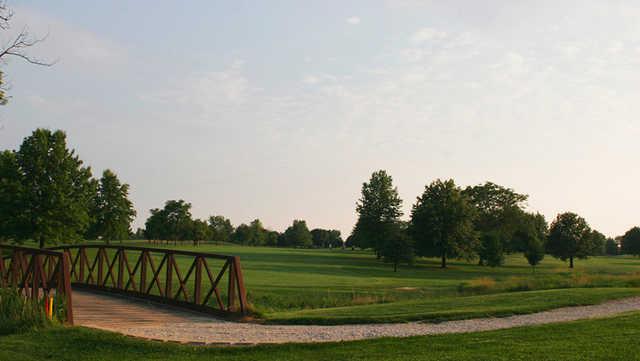 A view from Springbrook Golf Course with a bridge on the left side.