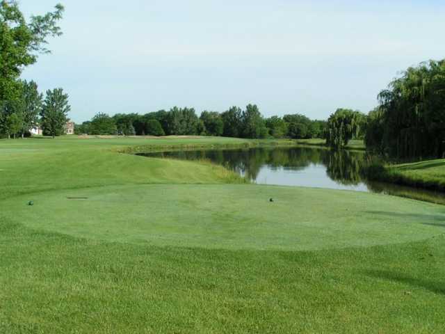 A view from tee with water on the right at Tamarack Golf Club