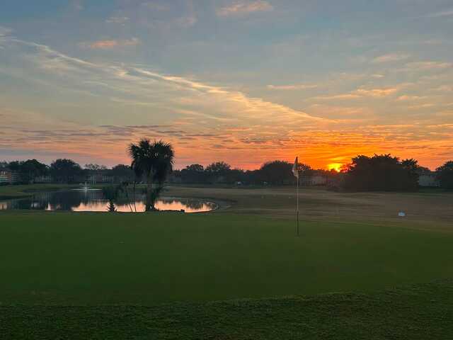 A sunrise day view of a hole at Mangrove Sands Golf Club.