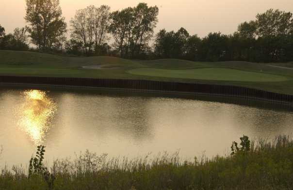 A view over the water of green #3 at Ironhorse Golf Course