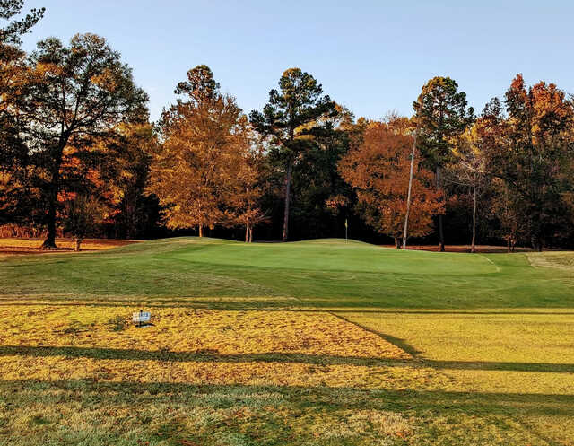 A fall day view of a green at Green Acres Golf & Recreation Club.