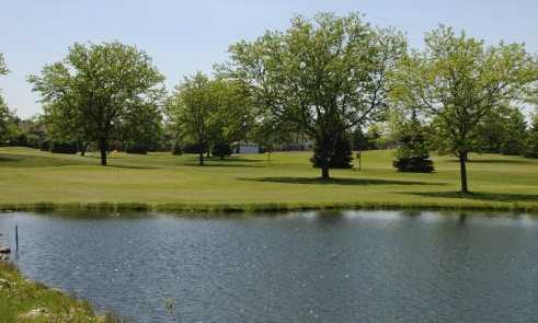 A view of green #4 from the left side of the pond at Zigfield Troy Golf Range & Par 3