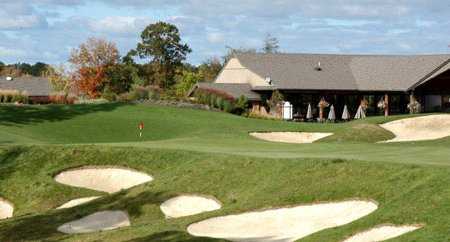 A view of the 18th green and clubhouse on the right at Little Mountain Country Club