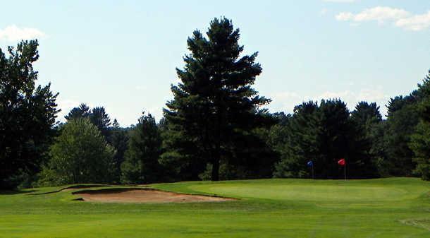 A view of a hole with a bunker on the left at East Hartford Golf Club