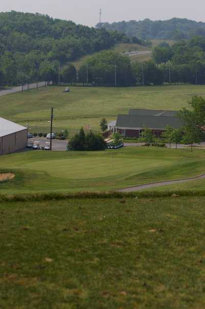 A view from tee #7 of the clubhouse and driving range at Country Hills Golf Club