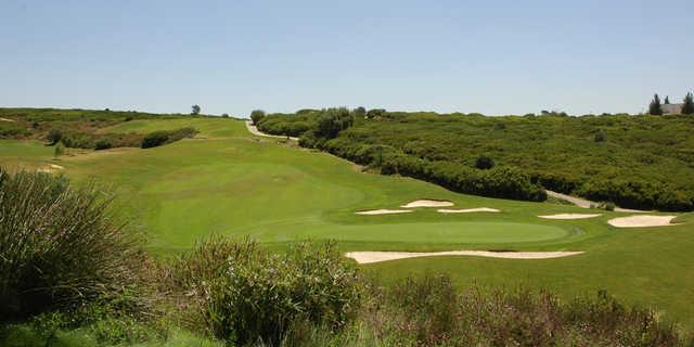 A view of green and fairway #5 at Belas Golf Club