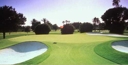 A view of a green protected by bunkers at Blue Course from Wigwam Resort