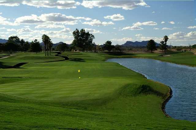 A view of a green with water coming into play at Silverbell Golf Course.