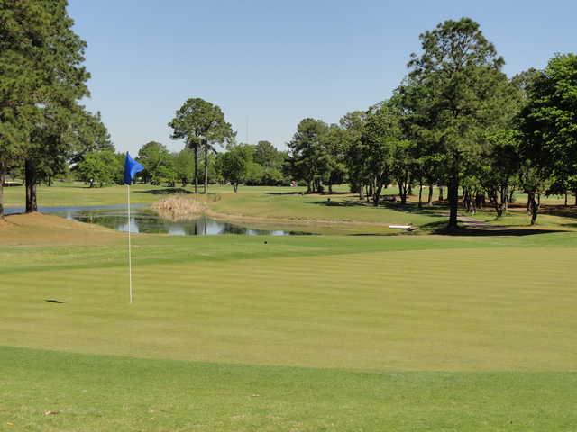 A view of green with water coming into play at Pine Crest Golf Club