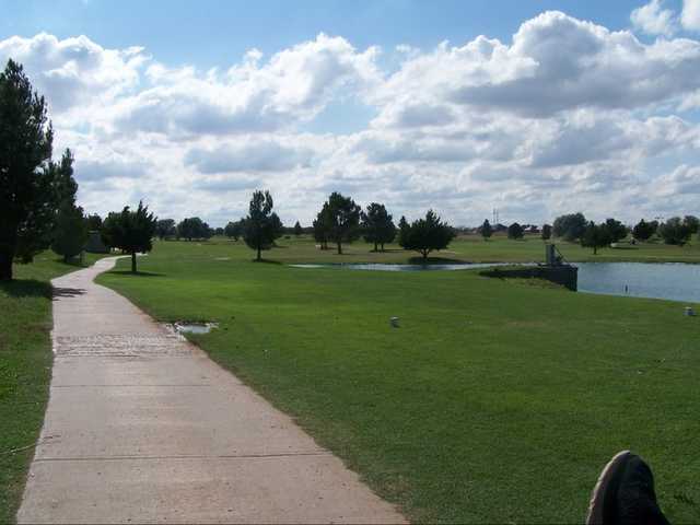 A view from narrow cart path at Stone Gate Golf Course